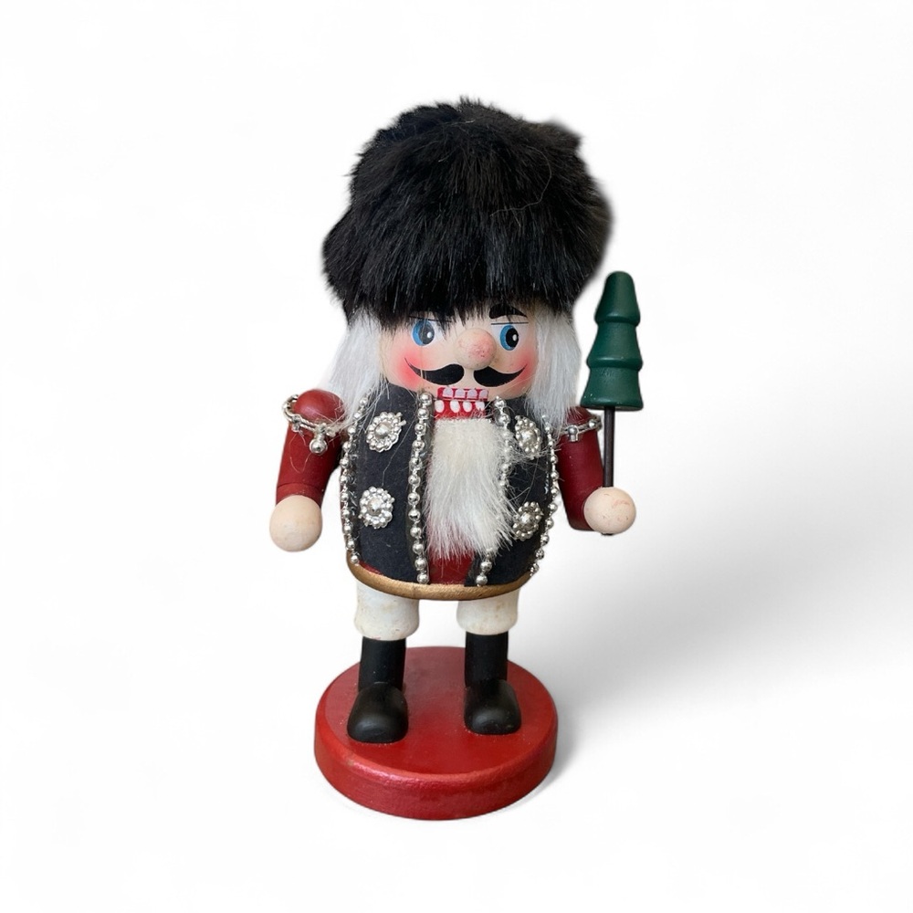 Charming Holiday Nutcracker with Black Hat and Red Base